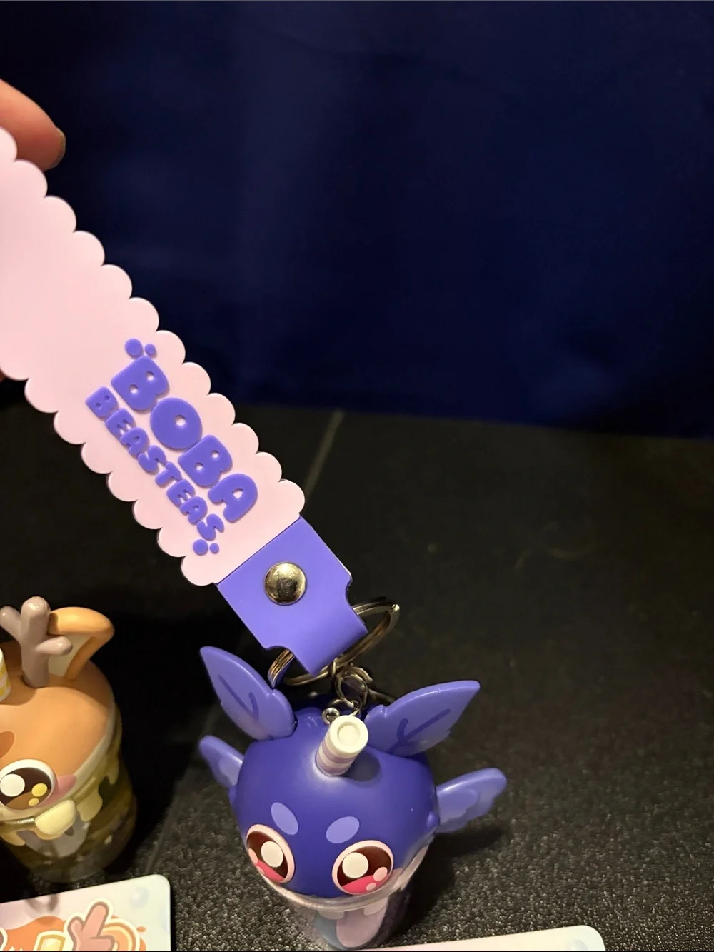 Moth Man Taro Tea Collectible Keychain - Purple set of toy keychains unboxed